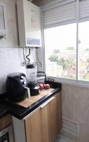 Apartamento à venda com 50m², 2 quartos e 1 vagaCozinha e Área de Serviço