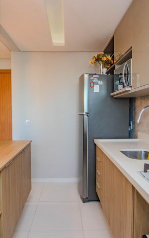 Apartamento à venda com 48m², 2 quartos e 1 vaga Apartamento à venda com 48m², 2 quartos e 1 vagaCozinha e Área de Serviço