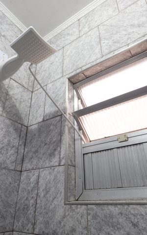 Casa à venda com 300m², 3 quartos e 3 vagasBanheiro da Suíte 2