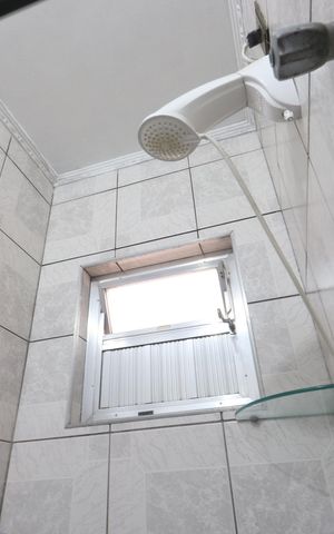 Casa à venda com 300m², 3 quartos e 3 vagasBanheiro da Suíte 1