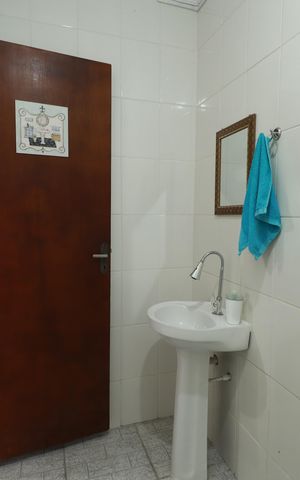 Casa à venda com 239m², 3 quartos e 3 vagasBanheiro de serviço