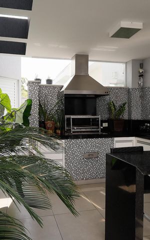 Casa de condomínio à venda com 450m², 4 quartos e 6 vagas Casa de condomínio à venda com 450m², 4 quartos e 6 vagasChurrasqueira