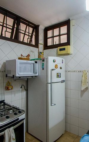 Casa à venda com 157m², 3 quartos e 3 vagas Casa à venda com 157m², 3 quartos e 3 vagasCozinha