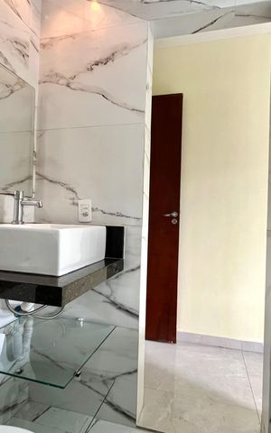 Casa de condomínio à venda com 60m², 2 quartos e 1 vaga Casa de condomínio à venda com 60m², 2 quartos e 1 vagaBanheiro da Suíte 2