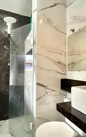 Casa de condomínio à venda com 60m², 2 quartos e 1 vaga Casa de condomínio à venda com 60m², 2 quartos e 1 vagaBanheiro da Suíte 2