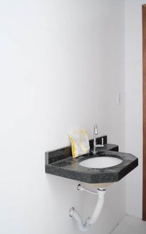 Apartamento à venda com 56m², 2 quartos e sem vagaBanheiro da Suíte 