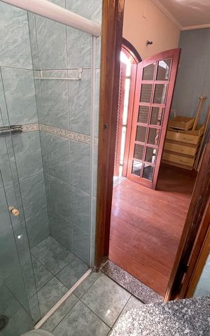 Casa à venda com 260m², 3 quartos e 3 vagas Casa à venda com 260m², 3 quartos e 3 vagasBanheiro da Suíte 2