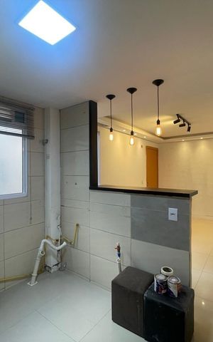 Apartamento à venda com 52m², 2 quartos e 1 vaga Apartamento à venda com 52m², 2 quartos e 1 vagaCozinha e área de serviço
