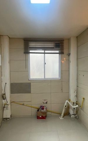 Apartamento à venda com 52m², 2 quartos e 1 vaga Apartamento à venda com 52m², 2 quartos e 1 vagaCozinha e área de serviço