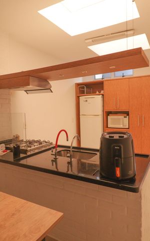 Casa à venda com 230m², 3 quartos e 5 vagas Casa à venda com 230m², 3 quartos e 5 vagasCozinha e Área de Serviço