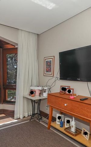 Casa à venda com 400m², 4 quartos e 4 vagasSala de TV