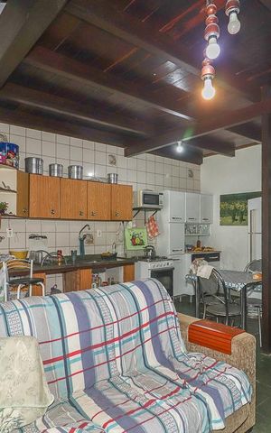Casa à venda com 400m², 4 quartos e 4 vagasCasa 2  - Sala / Cozinha