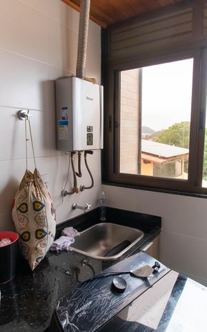 Apartamento à venda com 63m², 2 quartos e 1 vaga Apartamento à venda com 63m², 2 quartos e 1 vagaCozinha e Área de Serviço