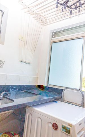 Apartamento à venda com 50m², 2 quartos e 1 vaga Apartamento à venda com 50m², 2 quartos e 1 vagaCozinha e Área de Serviço