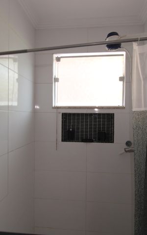 Casa de condomínio à venda com 200m², 4 quartos e 3 vagasBanheiro da Suíte 1