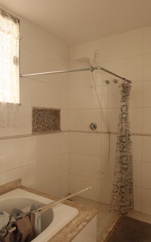 Casa de condomínio à venda com 200m², 4 quartos e 3 vagasBanheiro da Suíte 2