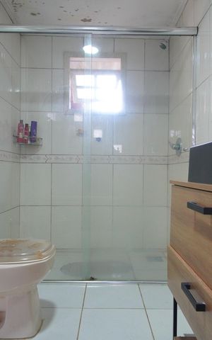 Casa à venda com 215m², 2 quartos e 4 vagasBanheiro da Suíte