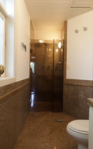 Casa à venda com 715m², 4 quartos e 8 vagasBanheiro da Suíte 4