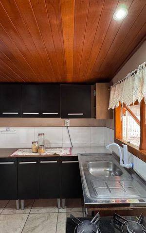 Casa à venda com 110m², 2 quartos e 4 vagas Casa à venda com 110m², 2 quartos e 4 vagasCozinha