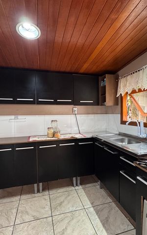Casa à venda com 110m², 2 quartos e 4 vagas Casa à venda com 110m², 2 quartos e 4 vagasCozinha