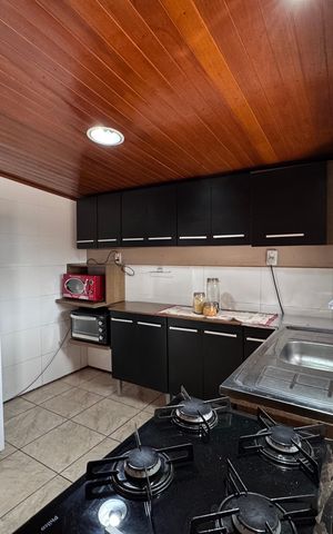 Casa à venda com 110m², 2 quartos e 4 vagas Casa à venda com 110m², 2 quartos e 4 vagasCozinha