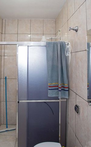 Casa à venda com 206m², 2 quartos e 2 vagasBanheiro Casa 2