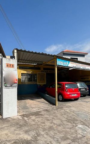 Casa à venda com 259m², 2 quartos e 3 vagasFachada + plaquinha