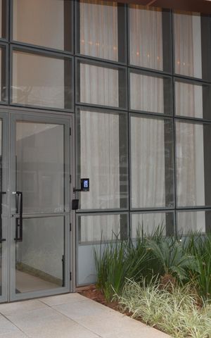 Apartamento à venda com 105m², 2 quartos e 2 vagasFachada + Plaquinha