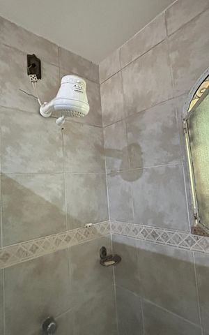 Casa de condomínio para alugar com 239m², 3 quartos e 1 vagaBanheiro da suíte
