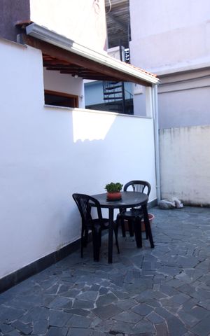 Casa à venda com 196m², 6 quartos e 2 vagasCasa 1 - Varanda dos Fundos