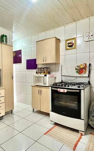 Casa à venda com 105m², 2 quartos e 1 vaga Casa à venda com 105m², 2 quartos e 1 vagaCozinha