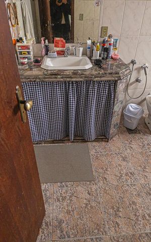 Casa à venda com 390m², 5 quartos e 4 vagasBanheiro Suíte 2