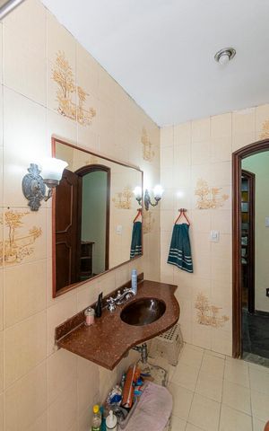 Casa à venda com 256m², 2 quartos e 2 vagas Casa à venda com 256m², 2 quartos e 2 vagasBanheiro da Suíte 1