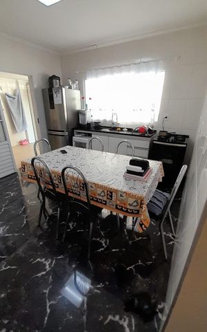 Casa à venda com 146m², 3 quartos e 2 vagas Casa à venda com 146m², 3 quartos e 2 vagasCozinha