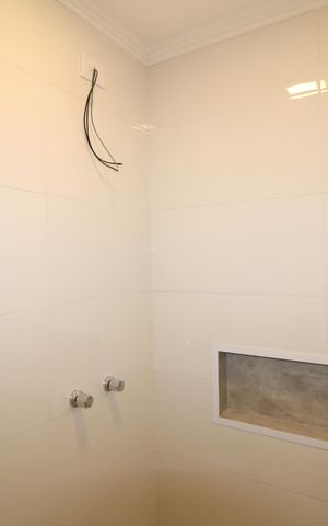 Casa à venda com 140m², 3 quartos e 2 vagasBanheiro - Suíte 2 