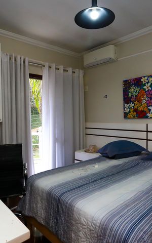 Casa de condomínio à venda com 340m², 4 quartos e 4 vagas Casa de condomínio à venda com 340m², 4 quartos e 4 vagasQuarto 1