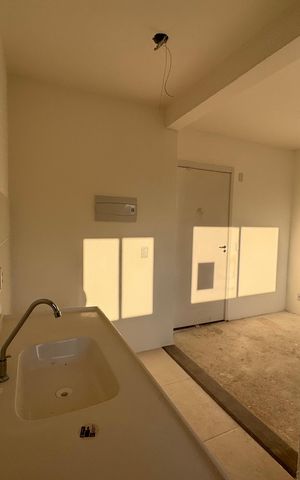 Apartamento à venda com 62m², 2 quartos e 1 vaga Apartamento à venda com 62m², 2 quartos e 1 vagaCozinha e Área de Serviço