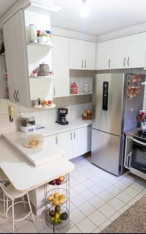 Casa à venda com 118m², 2 quartos e 2 vagas Casa à venda com 118m², 2 quartos e 2 vagasCozinha