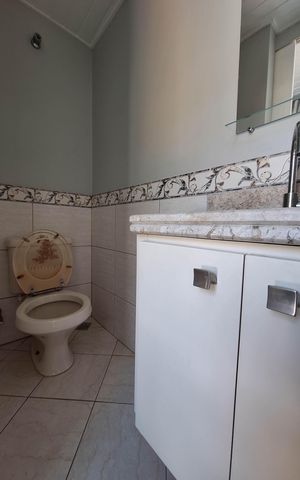 Casa à venda com 400m², 7 quartos e 5 vagas Casa à venda com 400m², 7 quartos e 5 vagasBanheiro 1