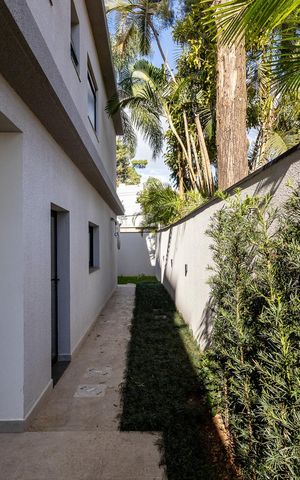 Casa de condomínio à venda com 350m², 4 quartos e 4 vagas Casa de condomínio à venda com 350m², 4 quartos e 4 vagasGaragem