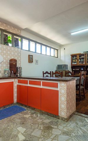 Casa à venda com 526m², 4 quartos e 4 vagas Casa à venda com 526m², 4 quartos e 4 vagasCozinha
