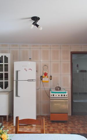 Casa à venda com 153m², 3 quartos e 2 vagas Casa à venda com 153m², 3 quartos e 2 vagasSala/Cozinha