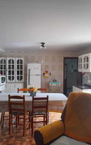 Casa à venda com 153m², 3 quartos e 2 vagas Casa à venda com 153m², 3 quartos e 2 vagasSala/Cozinha