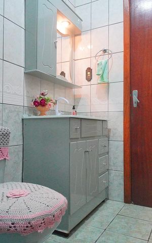 Casa à venda com 153m², 3 quartos e 2 vagas Casa à venda com 153m², 3 quartos e 2 vagasBanheiro
