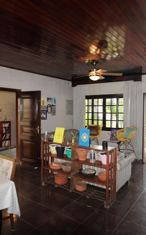 Casa à venda com 336m², 4 quartos e 3 vagasSala