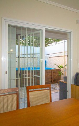 Casa à venda com 80m², 2 quartos e 2 vagas Casa à venda com 80m², 2 quartos e 2 vagasCozinha