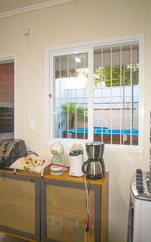Casa à venda com 80m², 2 quartos e 2 vagas Casa à venda com 80m², 2 quartos e 2 vagasCozinha
