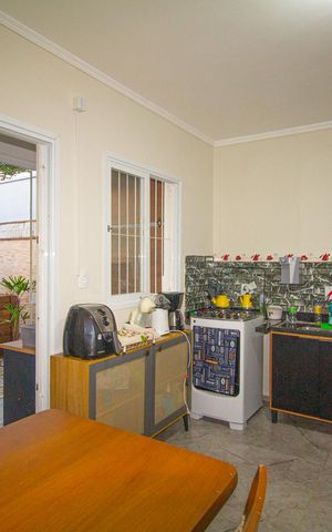 Casa à venda com 80m², 2 quartos e 2 vagas Casa à venda com 80m², 2 quartos e 2 vagasCozinha