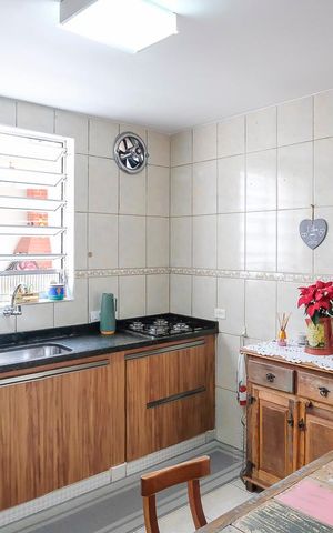 Casa à venda com 140m², 2 quartos e 2 vagasCozinha
