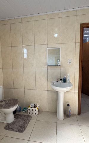 Casa à venda com 140m², 3 quartos e 2 vagas Casa à venda com 140m², 3 quartos e 2 vagasBanheiro
